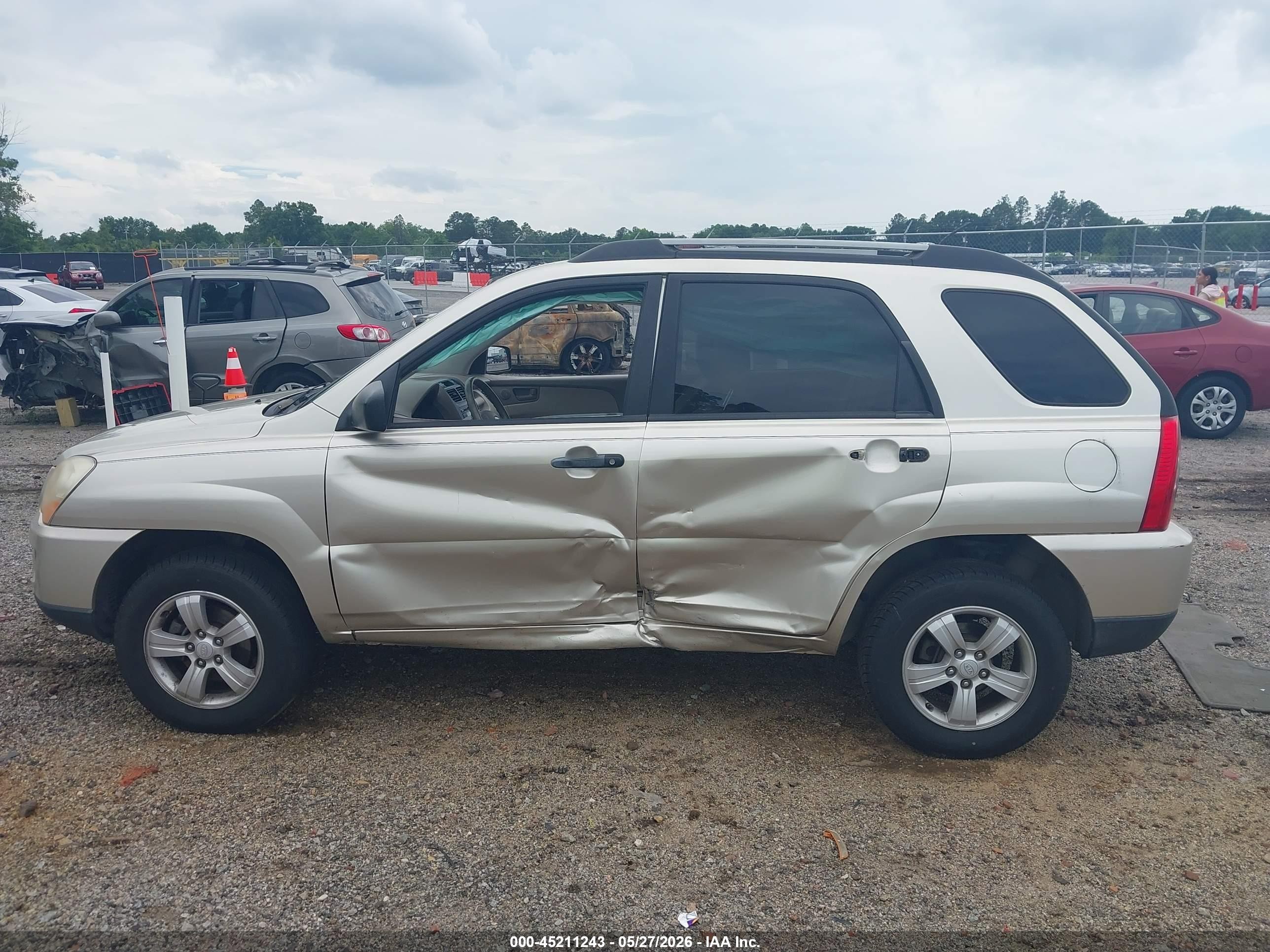 2009 Kia Sportage Lx Tan vin: KNDJF724697599907