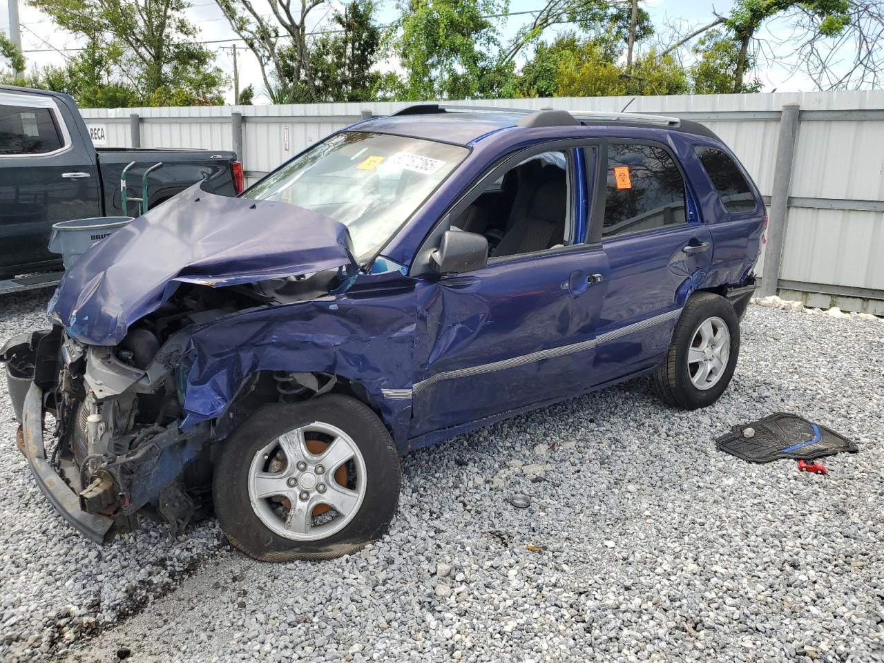 2006 Kia New Sportage    Blue vin: KNDJF724867185961