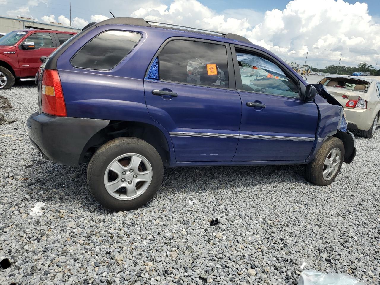 2006 Kia New Sportage    Blue vin: KNDJF724867185961