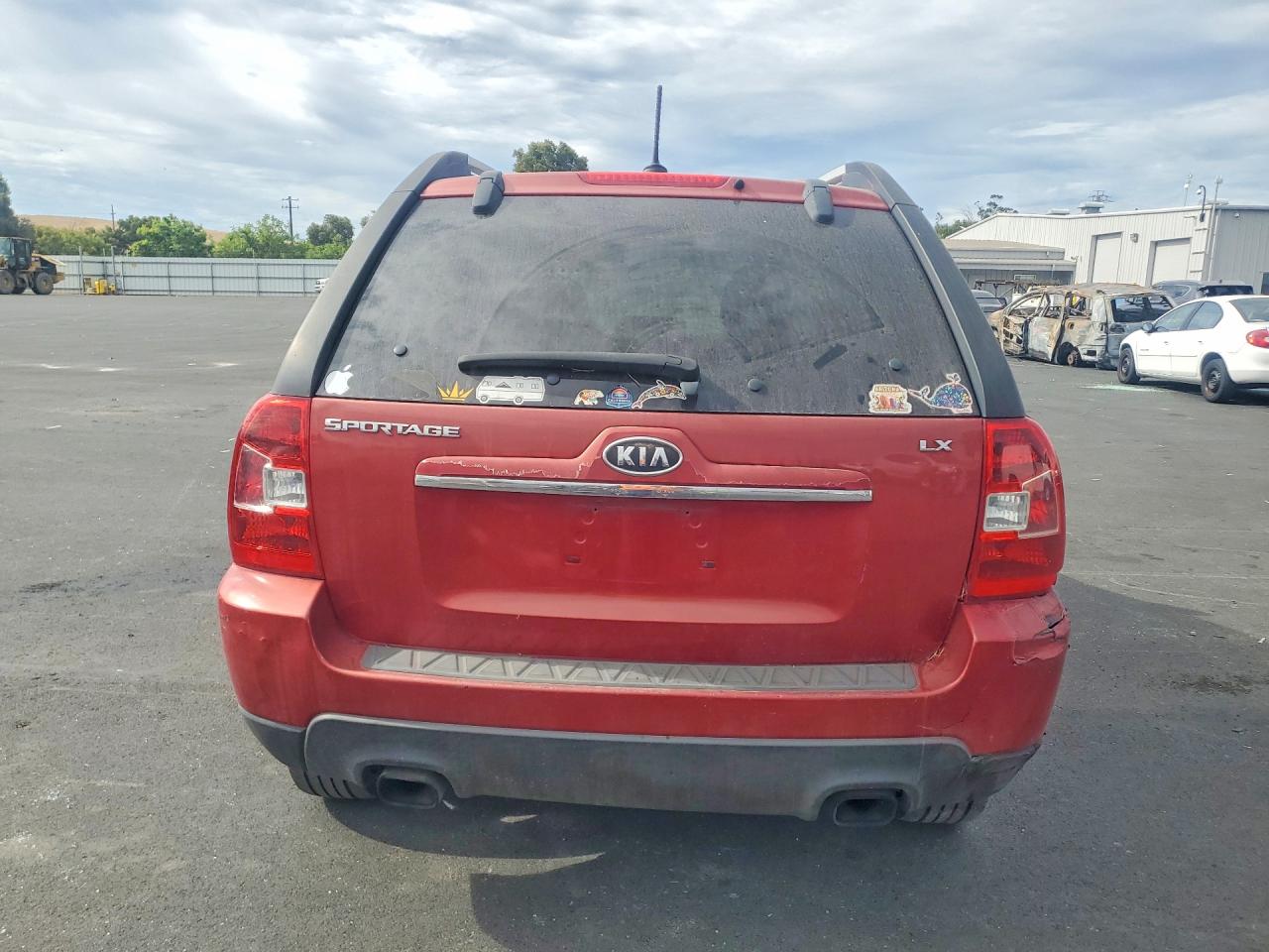 2009 Kia Sportage Lx Red vin: KNDJF724X97558048