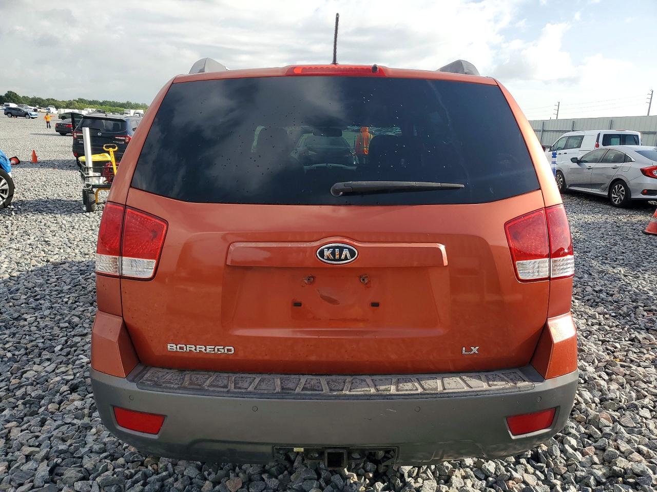 2009 Kia Borrego Lx Orange vin: KNDJH741095026395