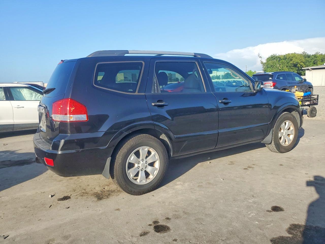 2009 Kia Borrego Lx/ex Черный vin: KNDJJ741195023638