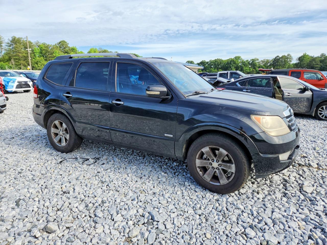 2009 Kia Borrego Ex V8 Black vin: KNDJJ742295039100