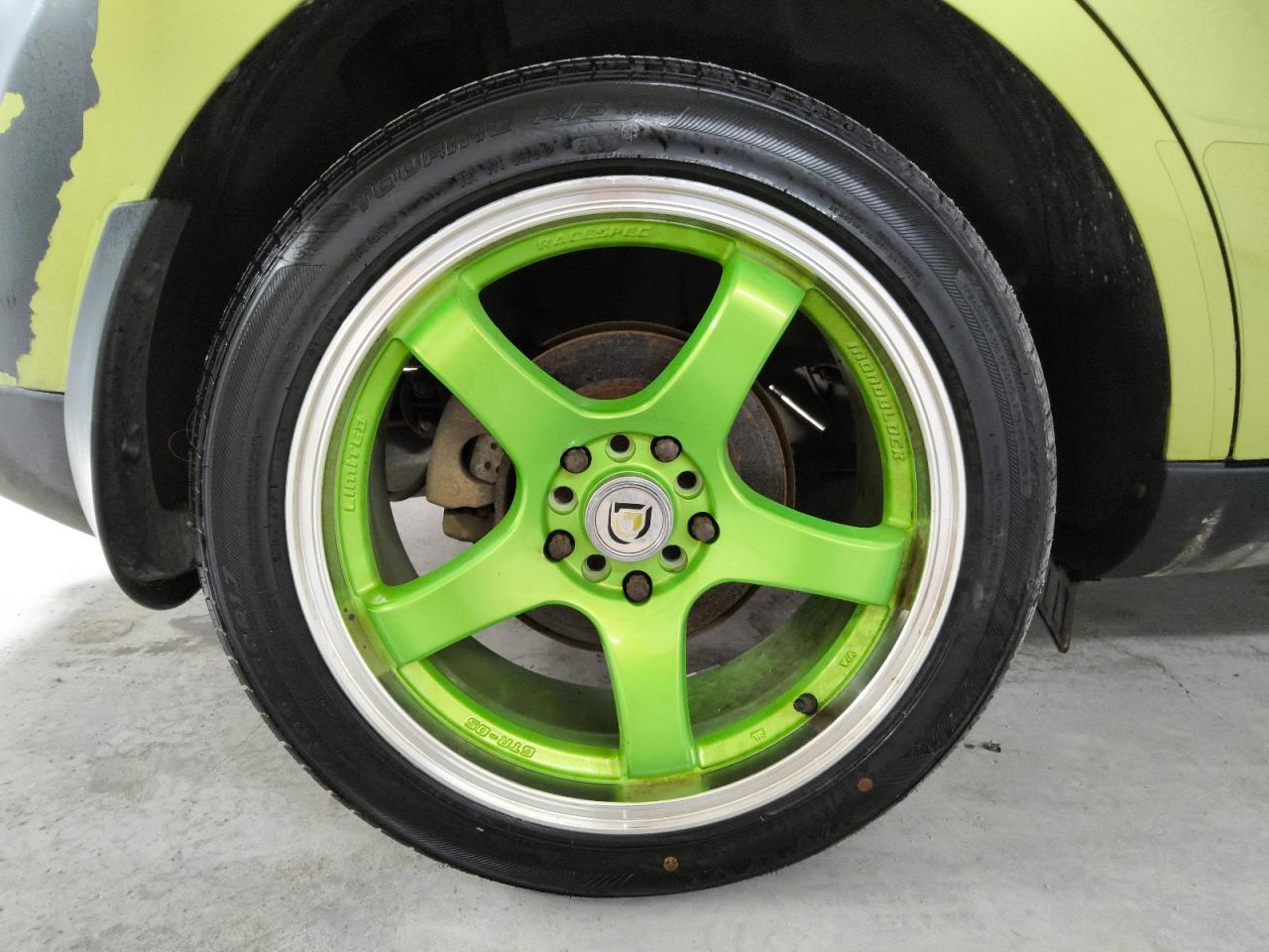 2015 Kia Soul Base Green vin: KNDJN2A22F7791410 Damage: Right Rear Wheel, Aftermarket, Acceptable