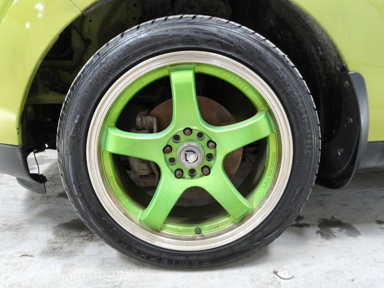 2015 Kia Soul Base Green vin: KNDJN2A22F7791410 Damage: Left Front Wheel, Aftermarket, Acceptable