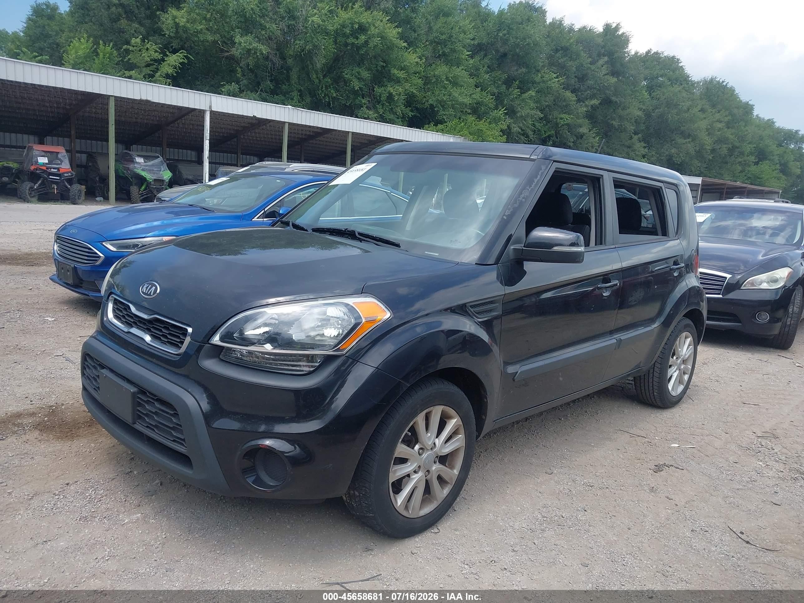 2012 Kia Soul + Black vin: KNDJT2A60C7354994