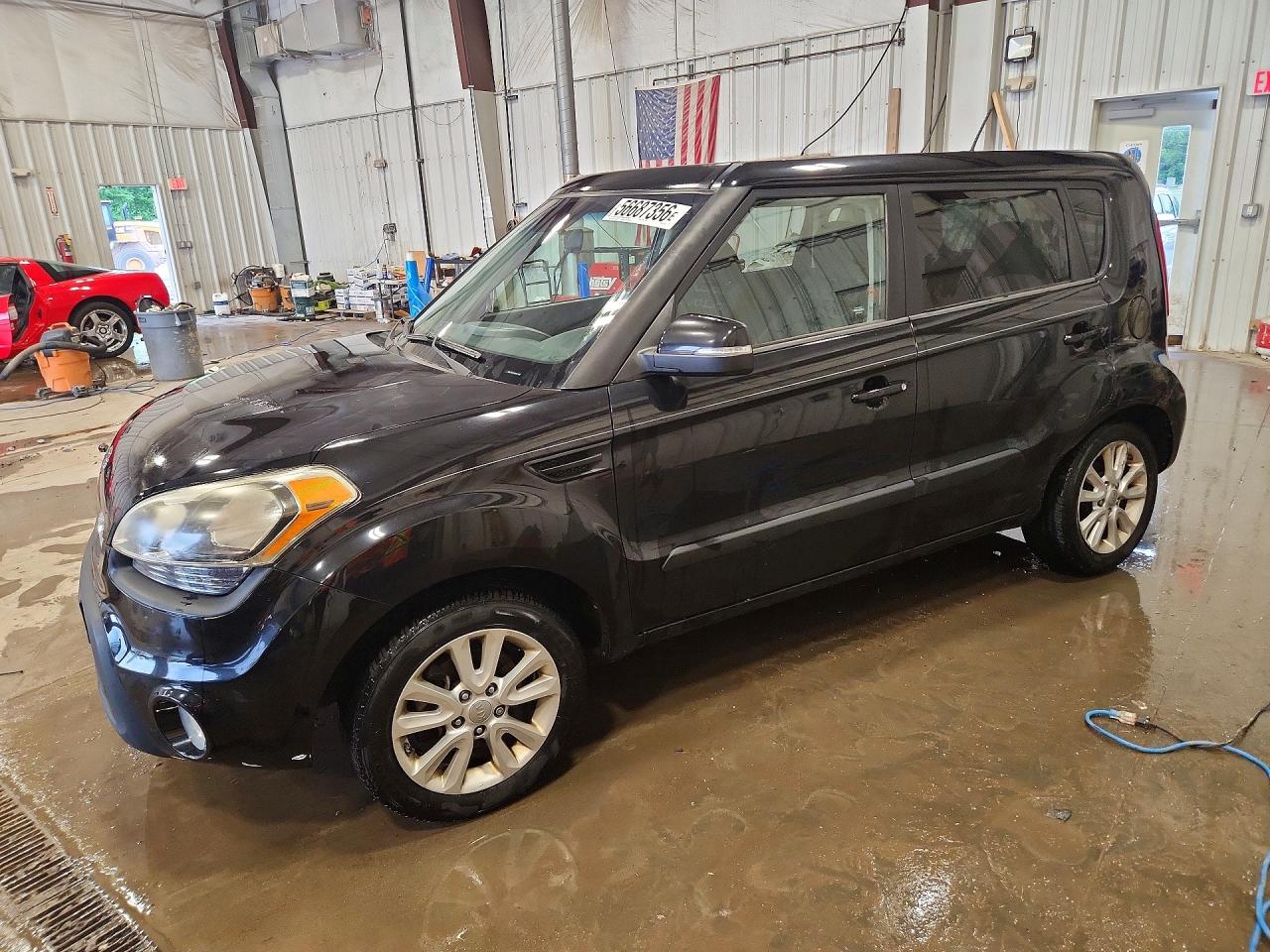 2012 Kia Soul + Black vin: KNDJT2A64C7743833