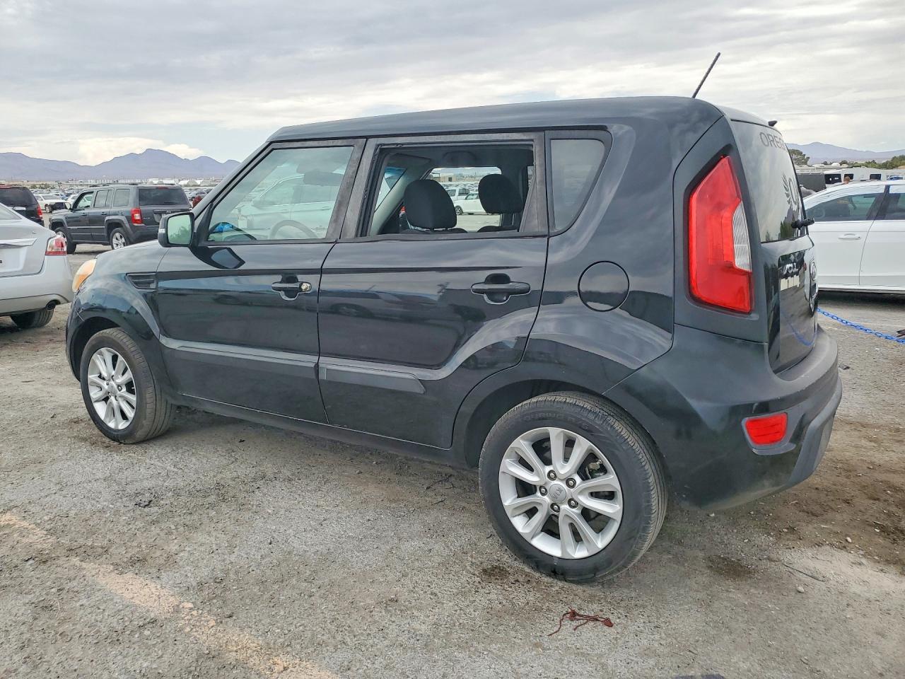 2012 Kia Soul + Black vin: KNDJT2A67C7460570