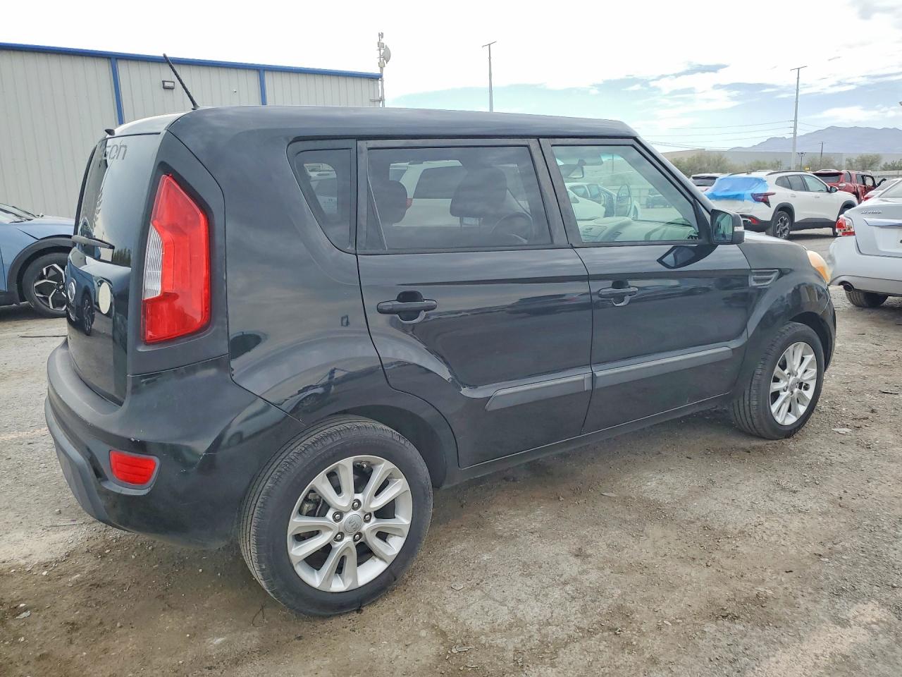 2012 Kia Soul + Black vin: KNDJT2A67C7460570