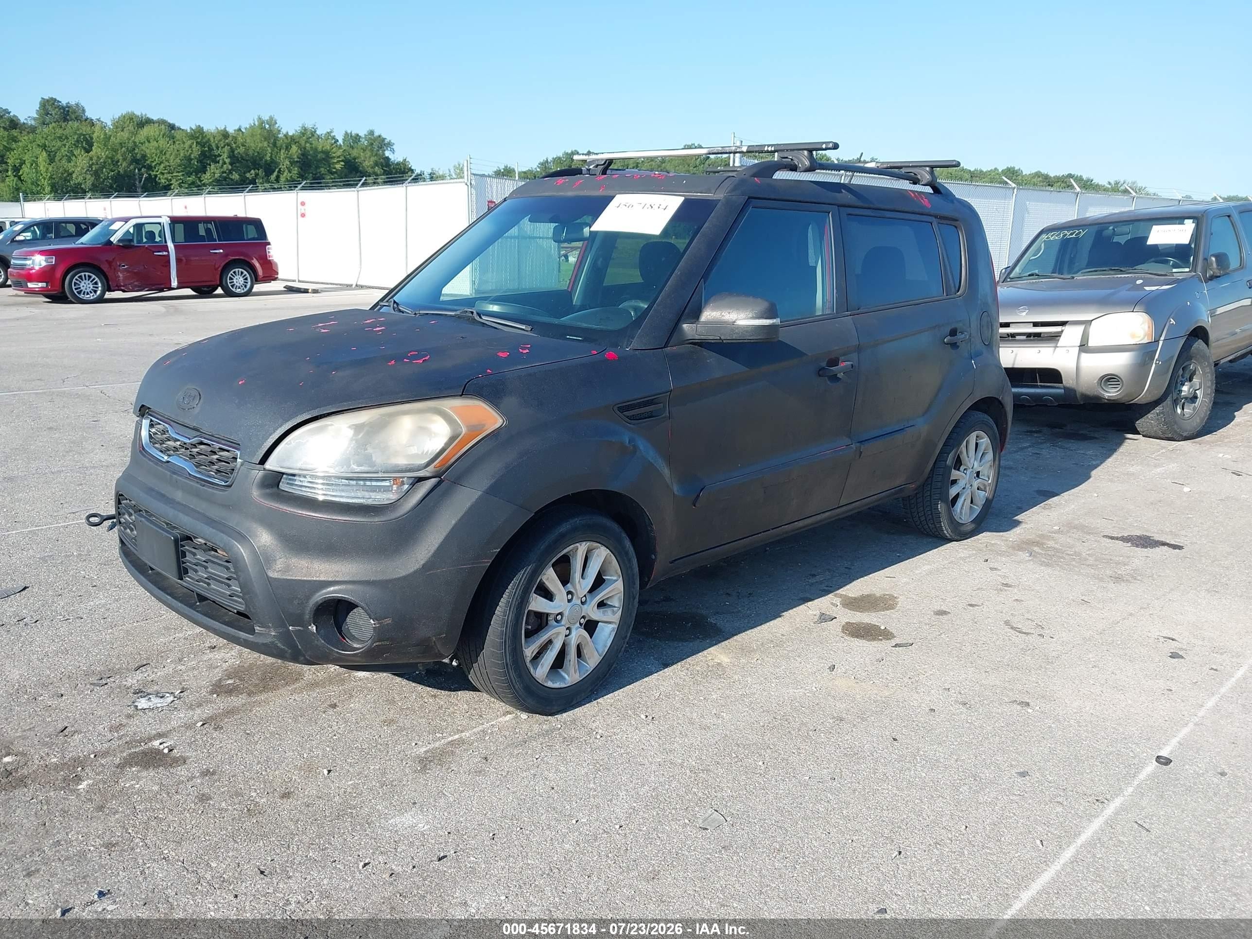 2012 Kia Soul + Black vin: KNDJT2A69C7371678