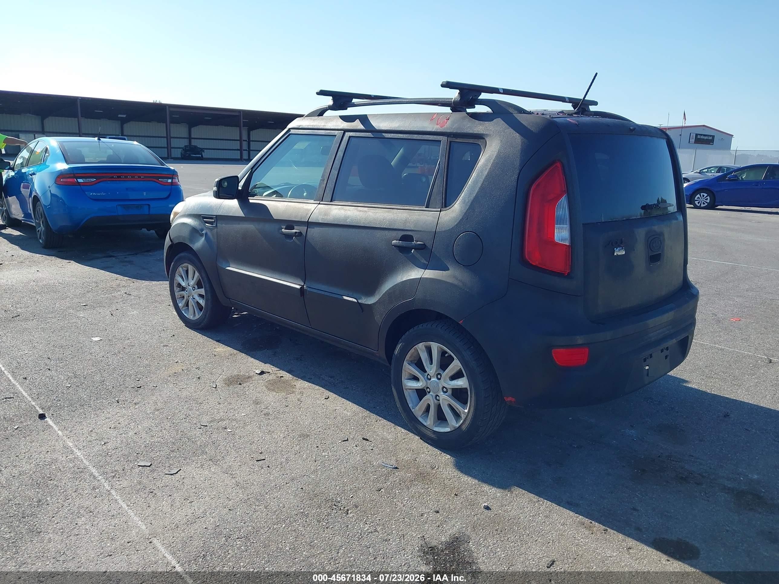 2012 Kia Soul + Black vin: KNDJT2A69C7371678