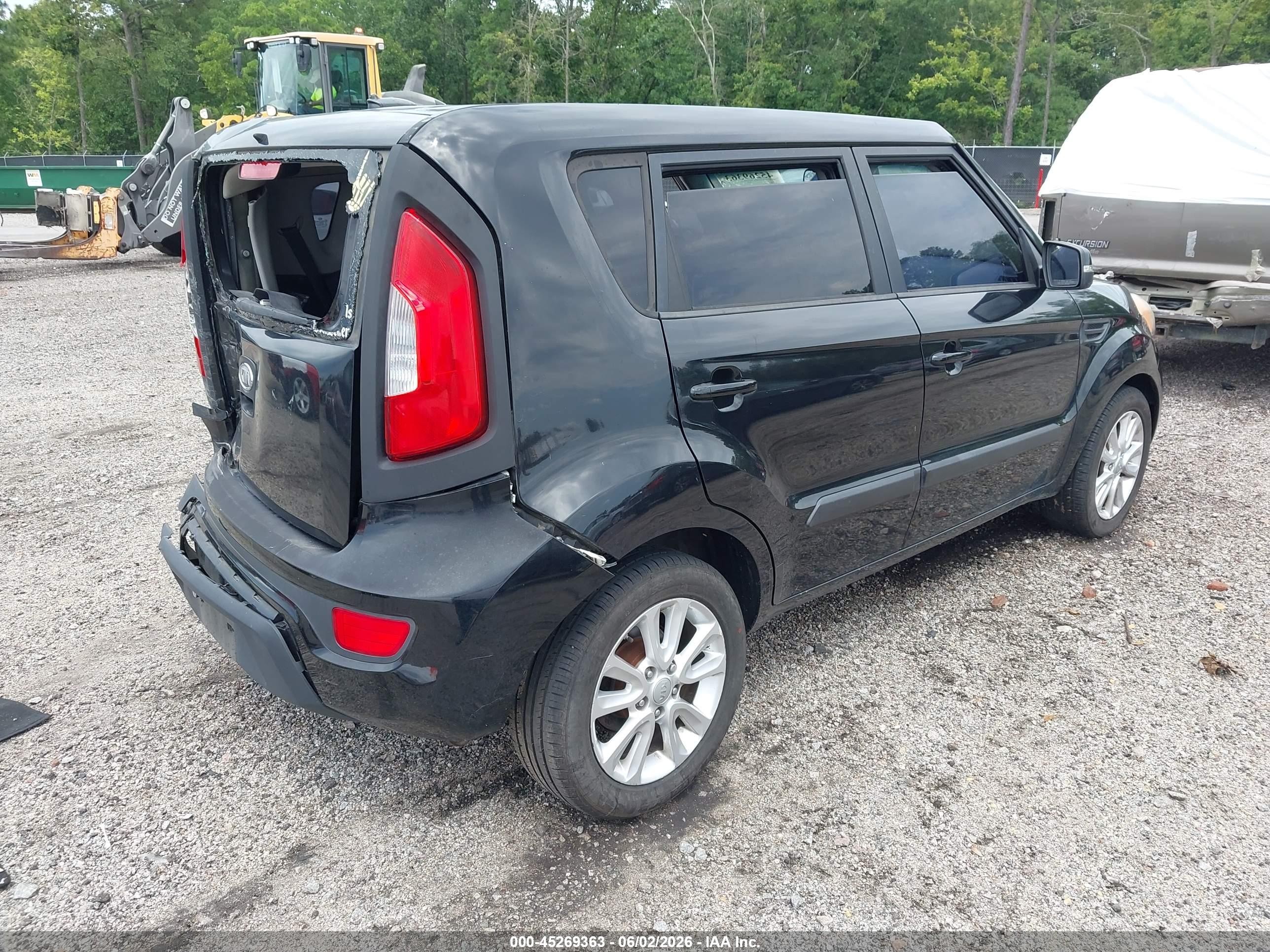 2012 Kia Soul + Black vin: KNDJT2A6XC7743724