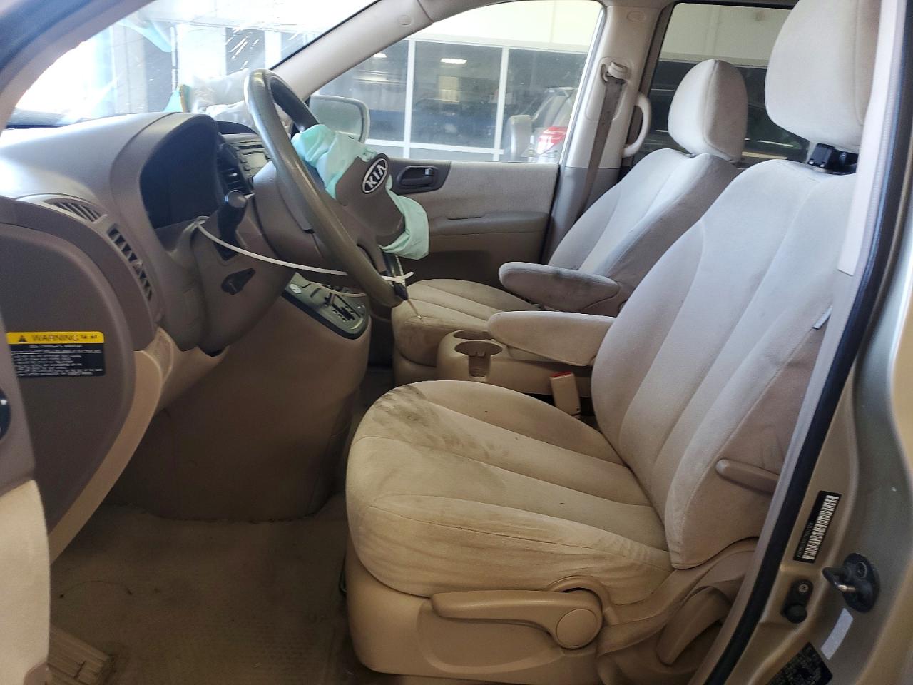 2007 Kia Sedona Base Gold vin: KNDMB233076162120