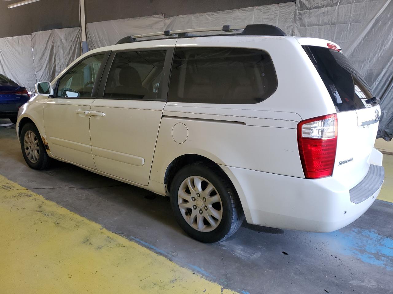 2007 Kia Sedona Base White vin: KNDMB233X76122787 Damage: Left Rear Tire, Worn, Replacement Required