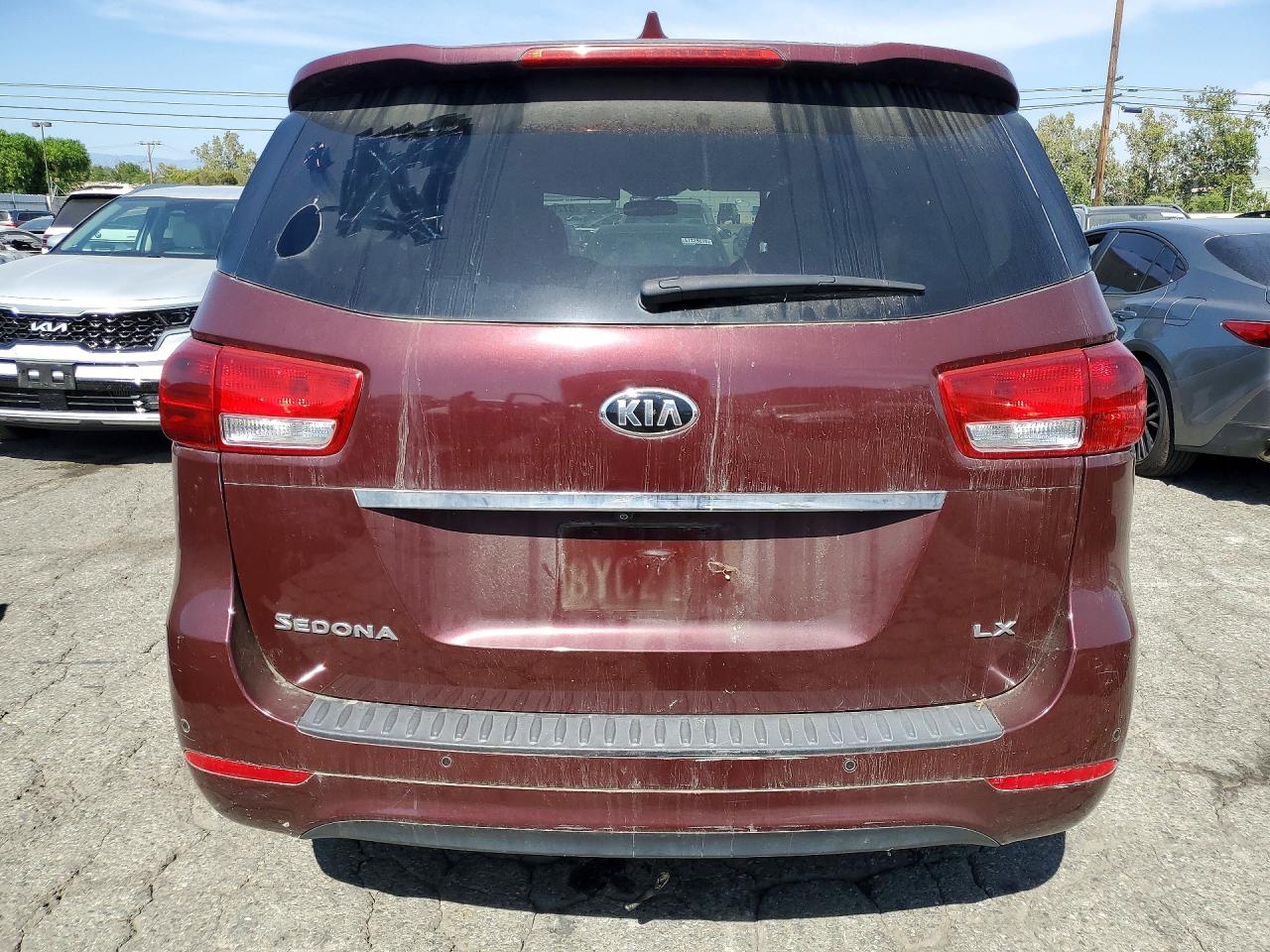 2017 Kia Sedona Lx Burgundy vin: KNDMB5C18H6266288