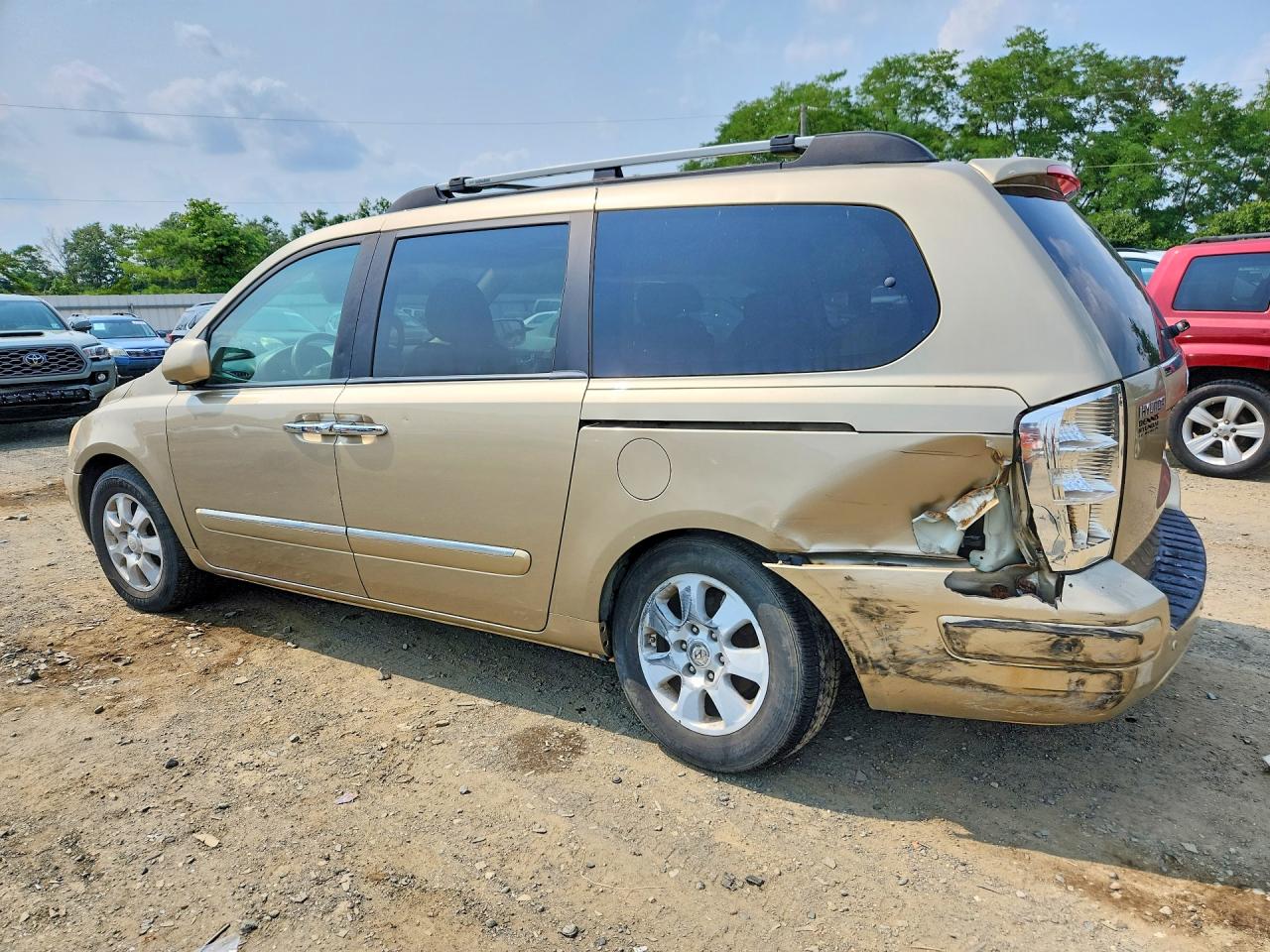 2007 Hyundai Entourage Gls Желто-коричневый vin: KNDMC233876034818