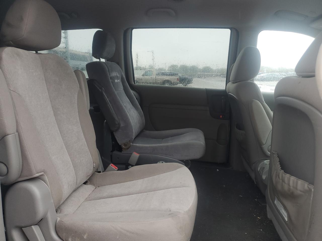 2011 Kia Sedona Lx Silver vin: KNDMG4C7XB6378064 Damage: Left Rear Seat, Aftermarket, Acceptable