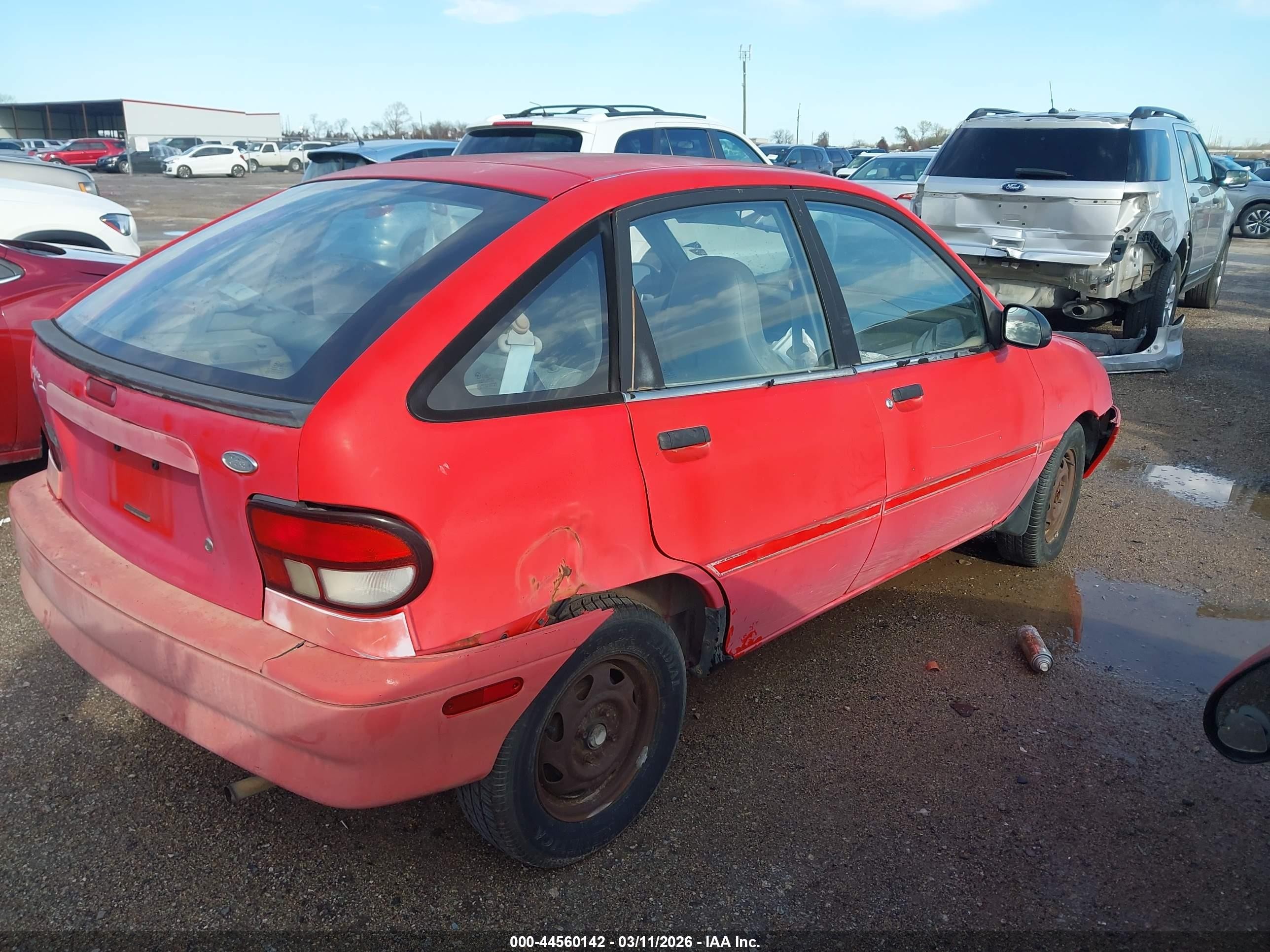 1995 Ford Aspire   Red vin: KNJLT06H5S6133870