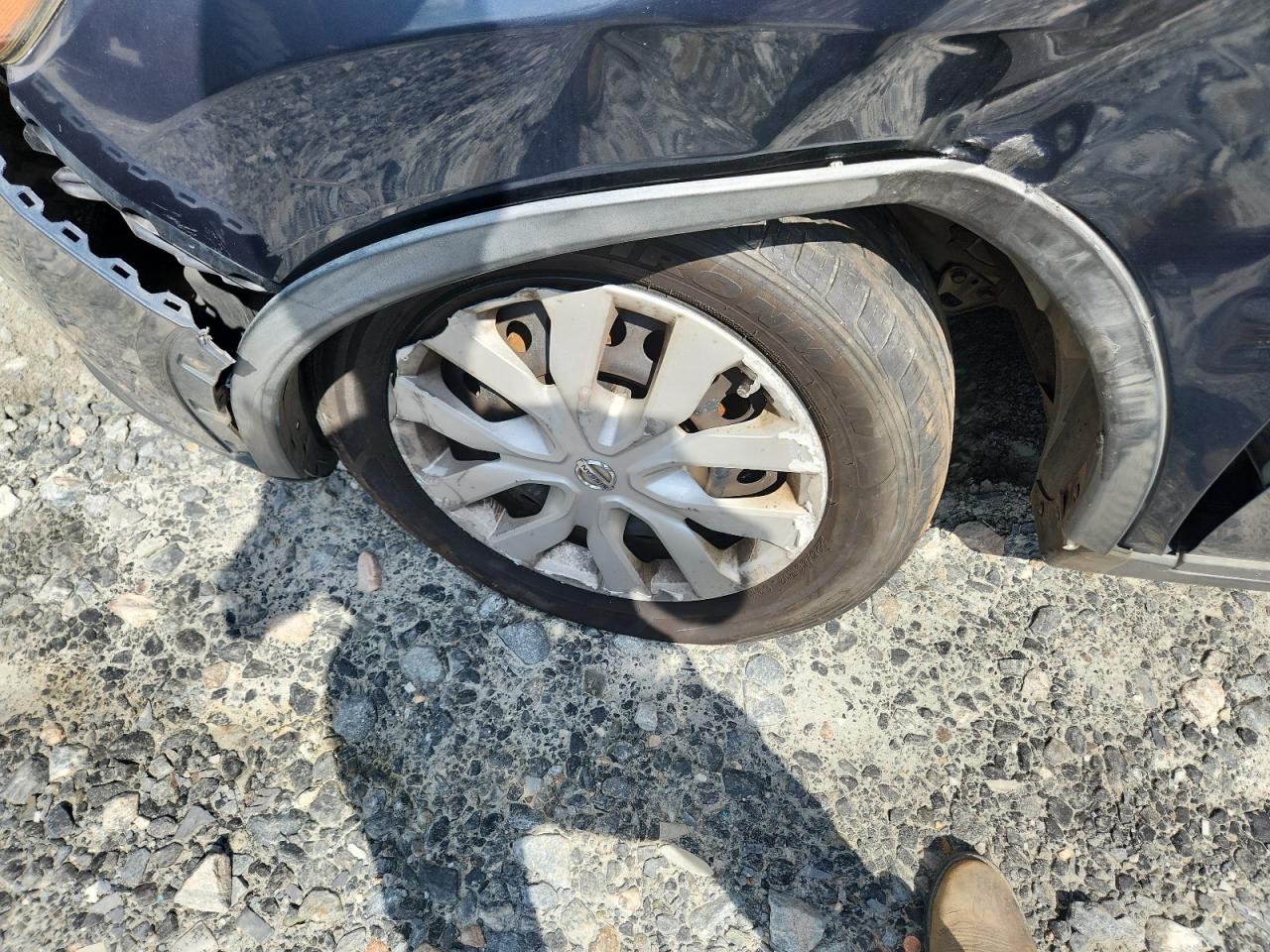 2015 Nissan Rogue S Blue vin: KNMAT2MT6FP576588 Damage: Left Front Wheel Cover, Broken, Replacement Required