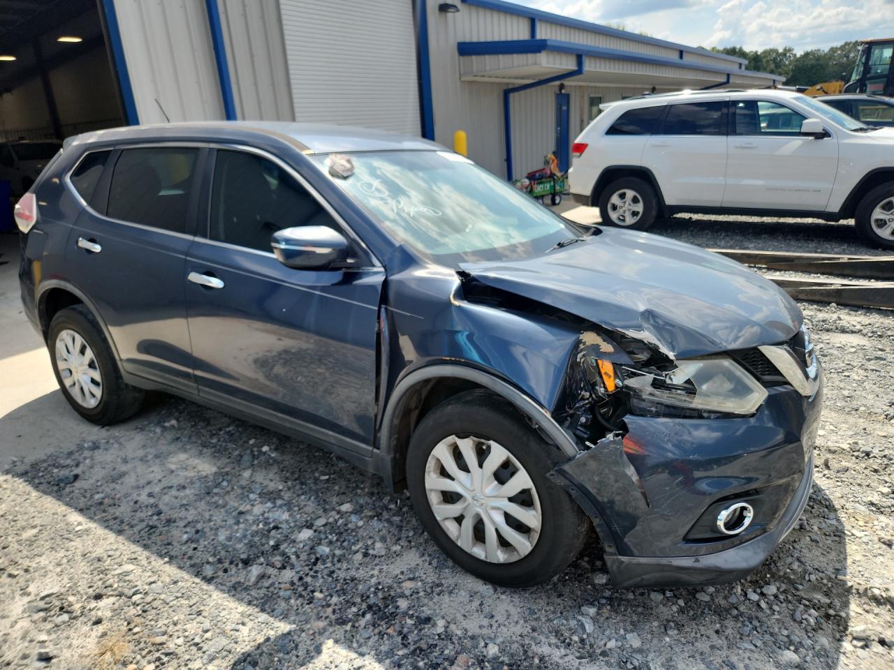 2015 Nissan Rogue S Blue vin: KNMAT2MT6FP576588 Damage: Right Head Lamp, Broken, Replacement Required