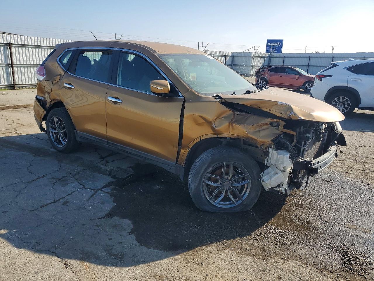 2015 Nissan Rogue S Orange vin: KNMAT2MT8FP504923