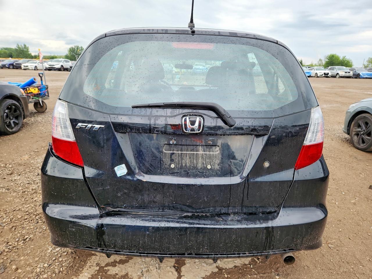 2012 Honda Fit Dx-a Black vin: LUCGE8H31C3003114