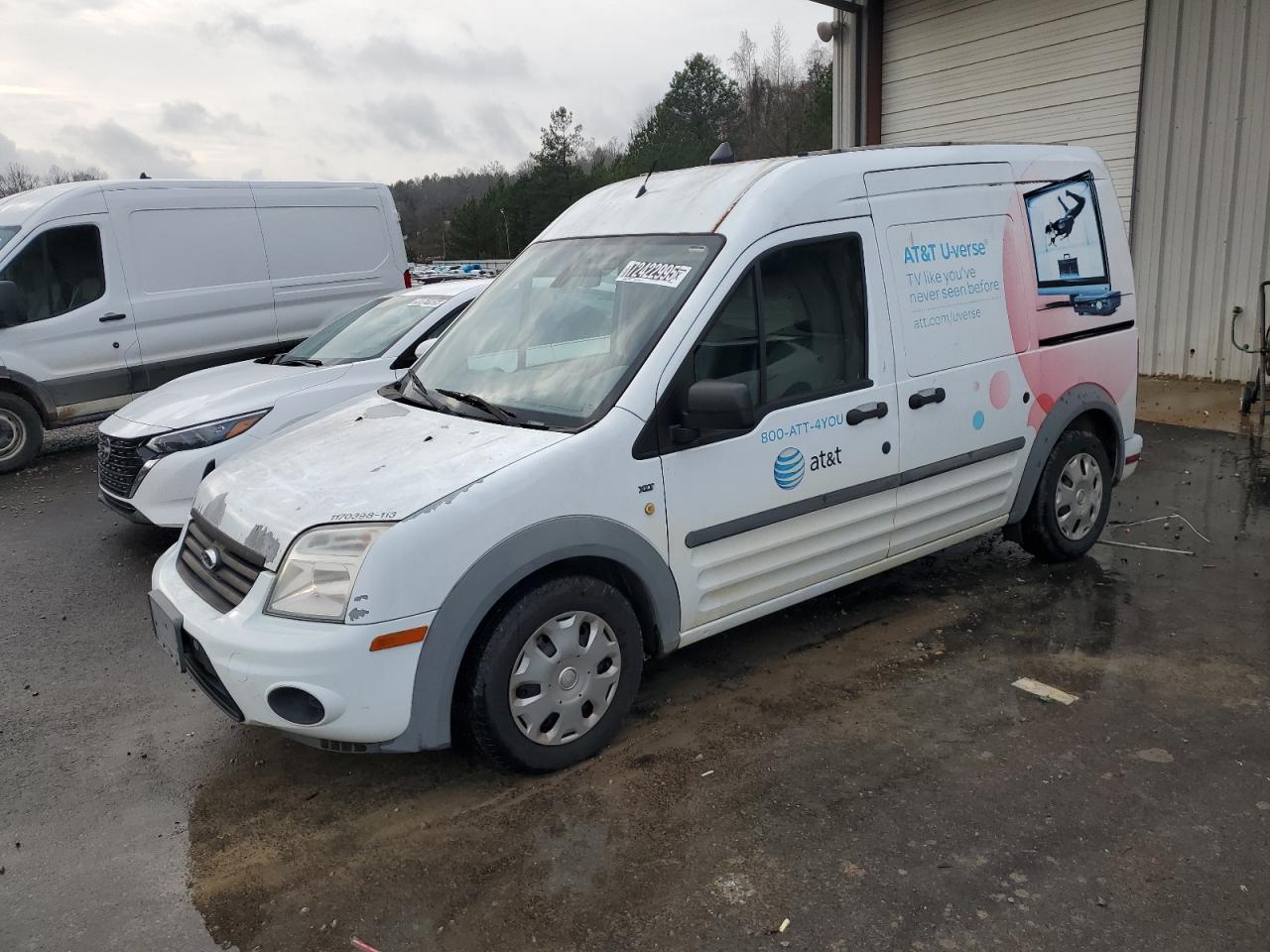 2013 Ford Transit Connect White vin: NM0LS7BN7DT136135 Damage: Left Front Fender, Peeling, > 12 Inches