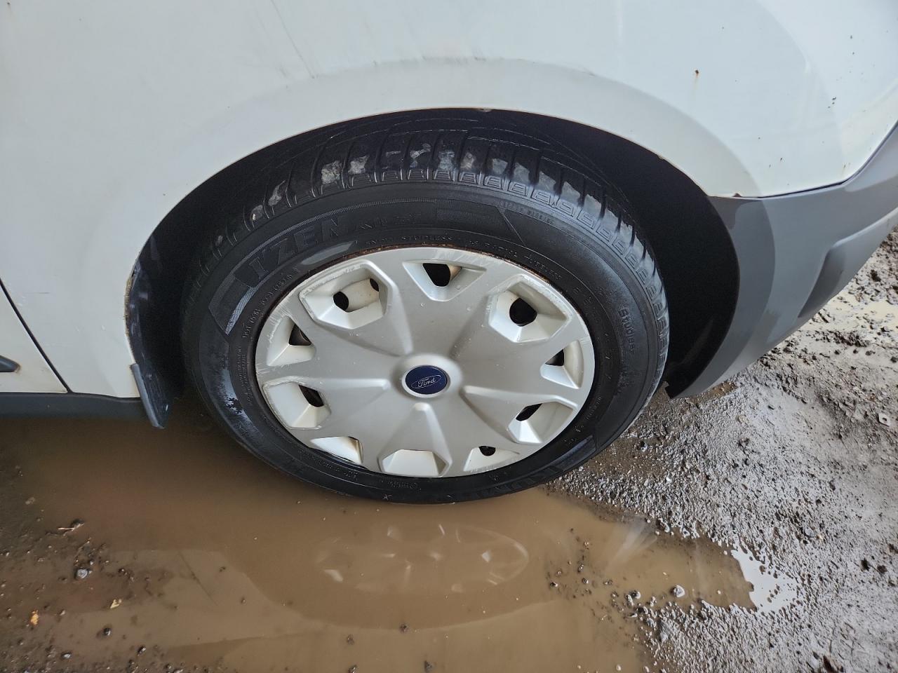 2014 Ford Transit Connect Xl White vin: NM0LS7E75E1143739 Damage: Right Front Wheel Cover, Curb Rash, > 12 Inches