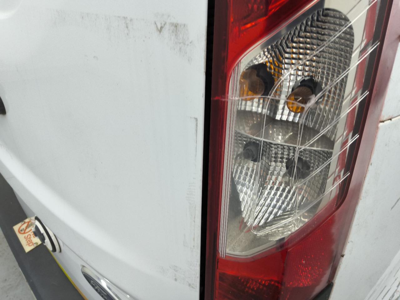 2014 Ford Transit Connect Xl White vin: NM0LS7E77E1173017 Damage: Right Tail Light, Cracked, Replacement Required
