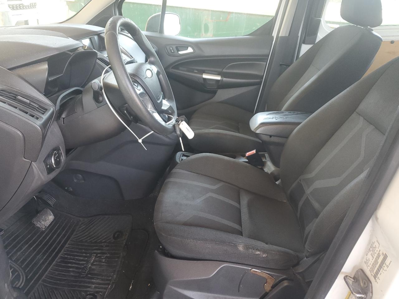 2014 Ford Transit Connect Xlt White vin: NM0LS7F74E1150065 Damage: Left Front Seat Cushion, Torn, 1 To 2 Inches