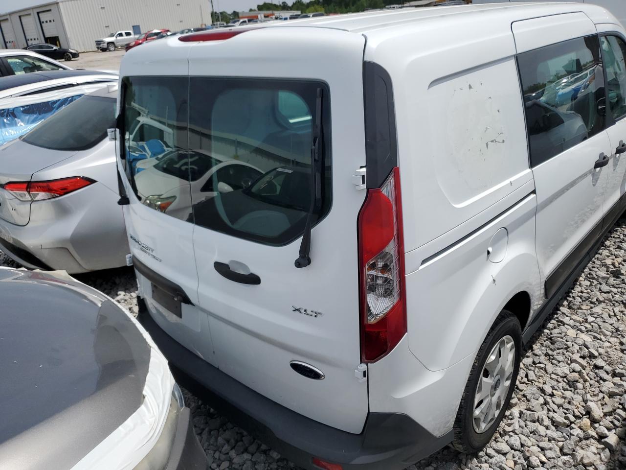 2014 Ford Transit Connect Xlt White vin: NM0LS7F78E1150540 Damage: Right Qtr Panel, Peeling, 5 To 6 Inches