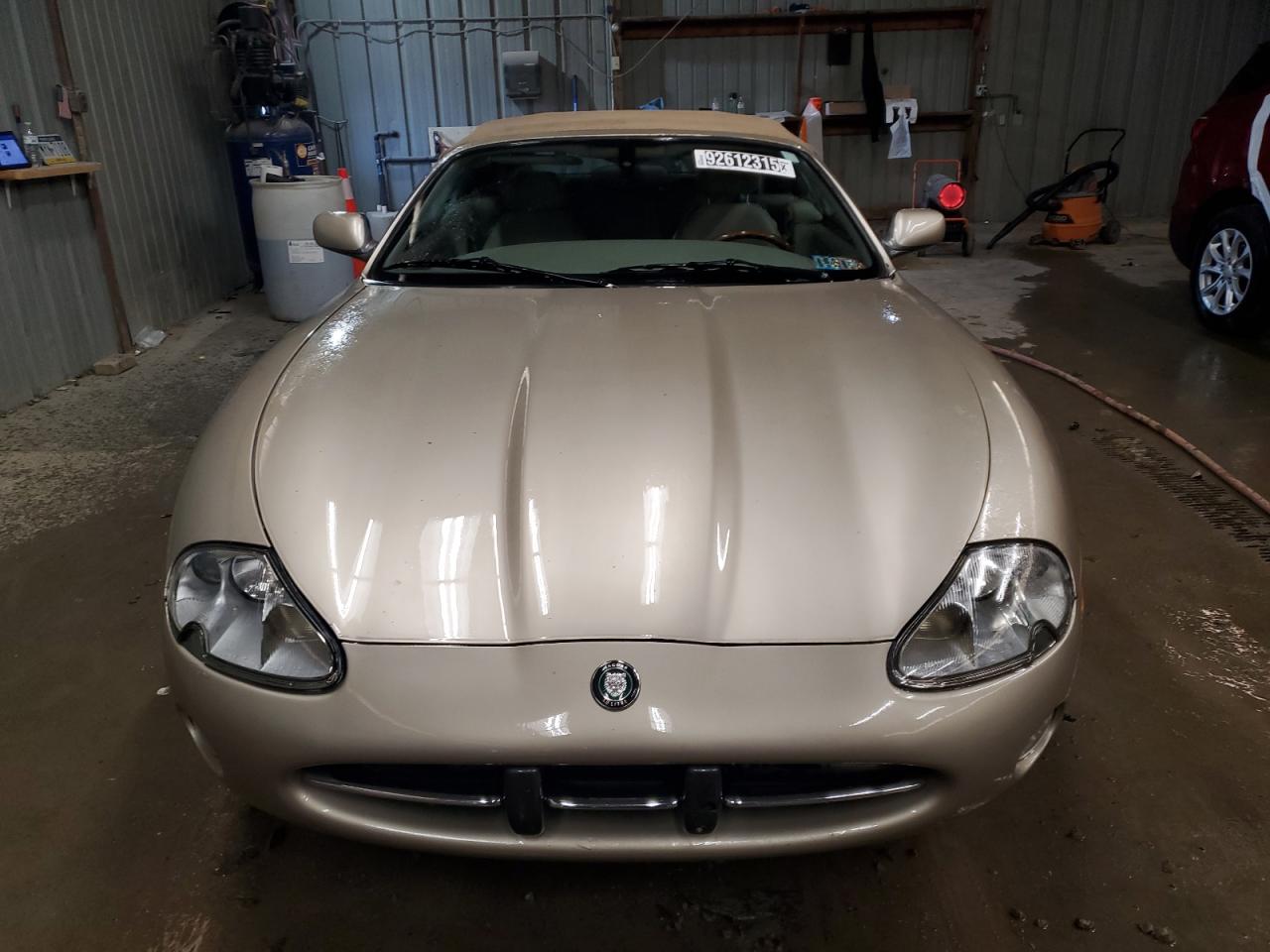 2002 Jaguar Xk8 Tan vin: SAJDA42C72NA24092 Damage: Hood, Chipped, 2