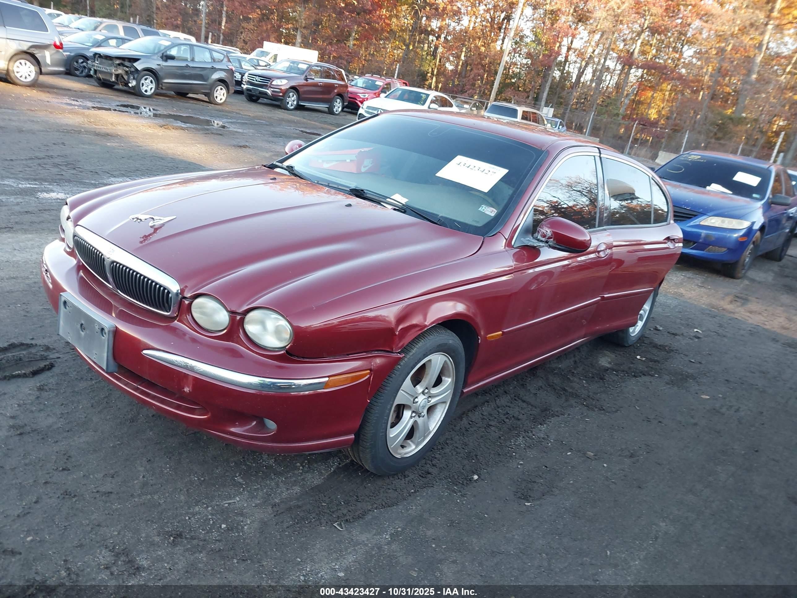 2002 Jaguar X-type 3.0l Burgundy vin: SAJEA51C62WC55779