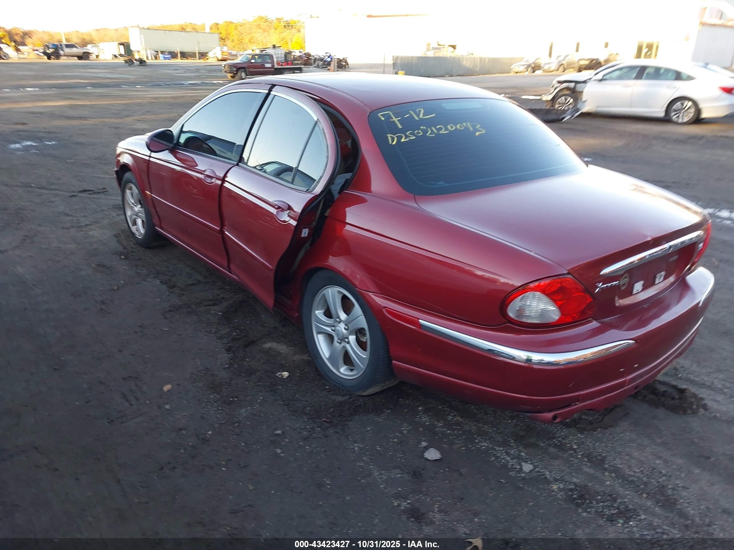2002 Jaguar X-type 3.0l Burgundy vin: SAJEA51C62WC55779