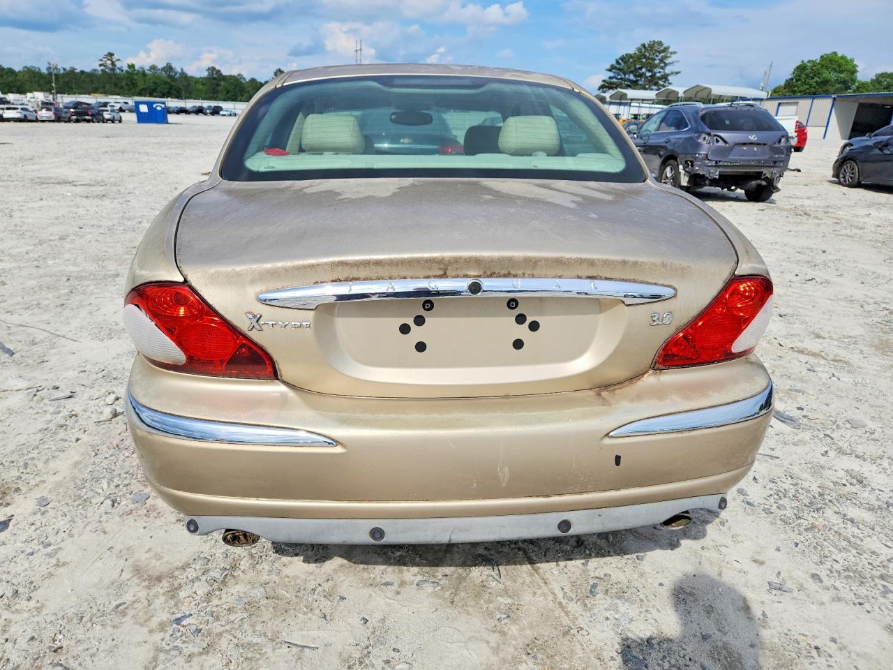 2002 Jaguar X-type 3.0 Gold vin: SAJEA51C92WC64282