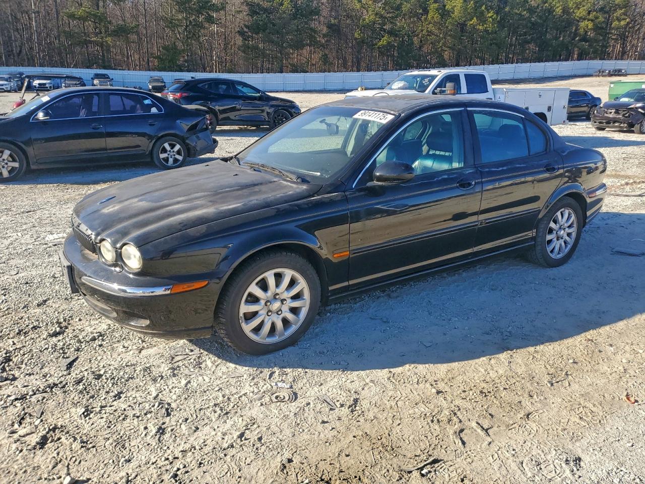 2002 Jaguar X-type 2.5 Black vin: SAJEA51D02XC46451