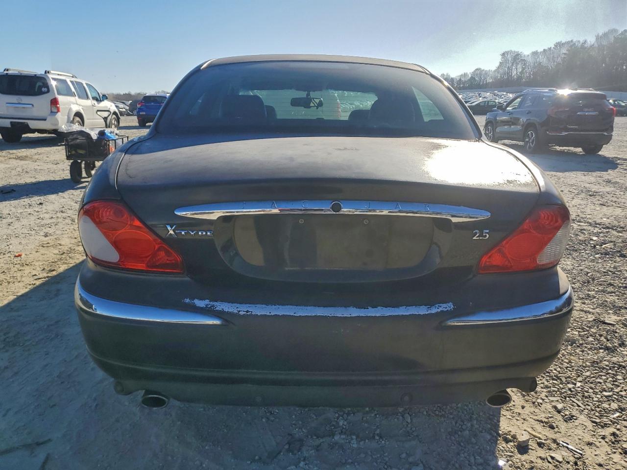 2002 Jaguar X-type 2.5 Black vin: SAJEA51D02XC46451