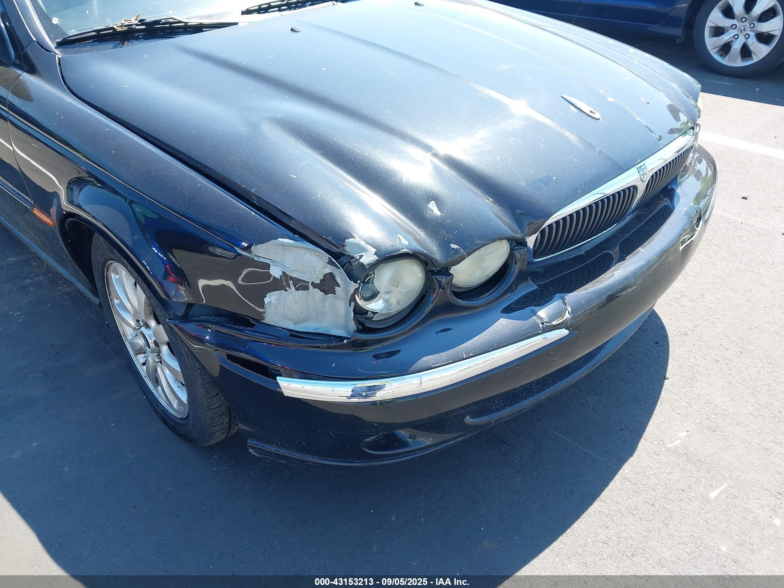 2002 Jaguar X-type 2.5l Black vin: SAJEA51D22XC27528