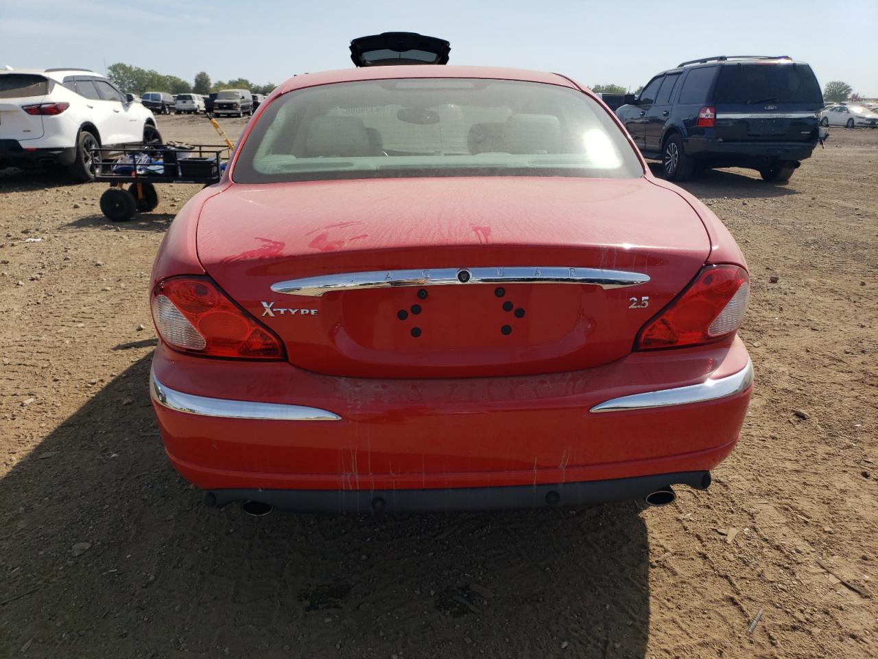 2002 Jaguar X-type 2.5 Red vin: SAJEA51D52XC67019