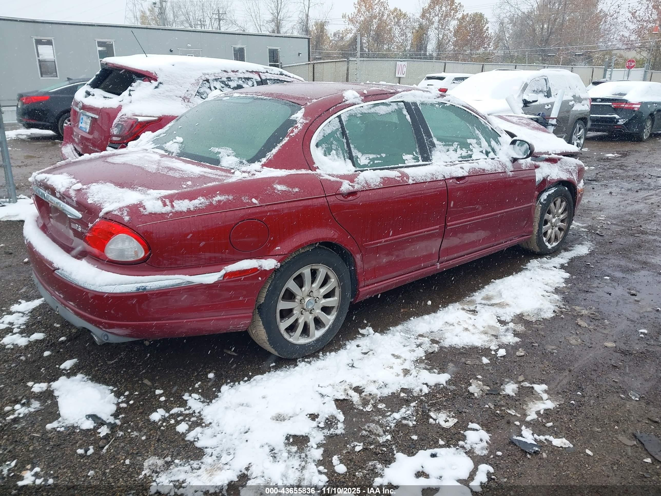 2002 Jaguar X-type 2.5l Red vin: SAJEA51D52XC67098