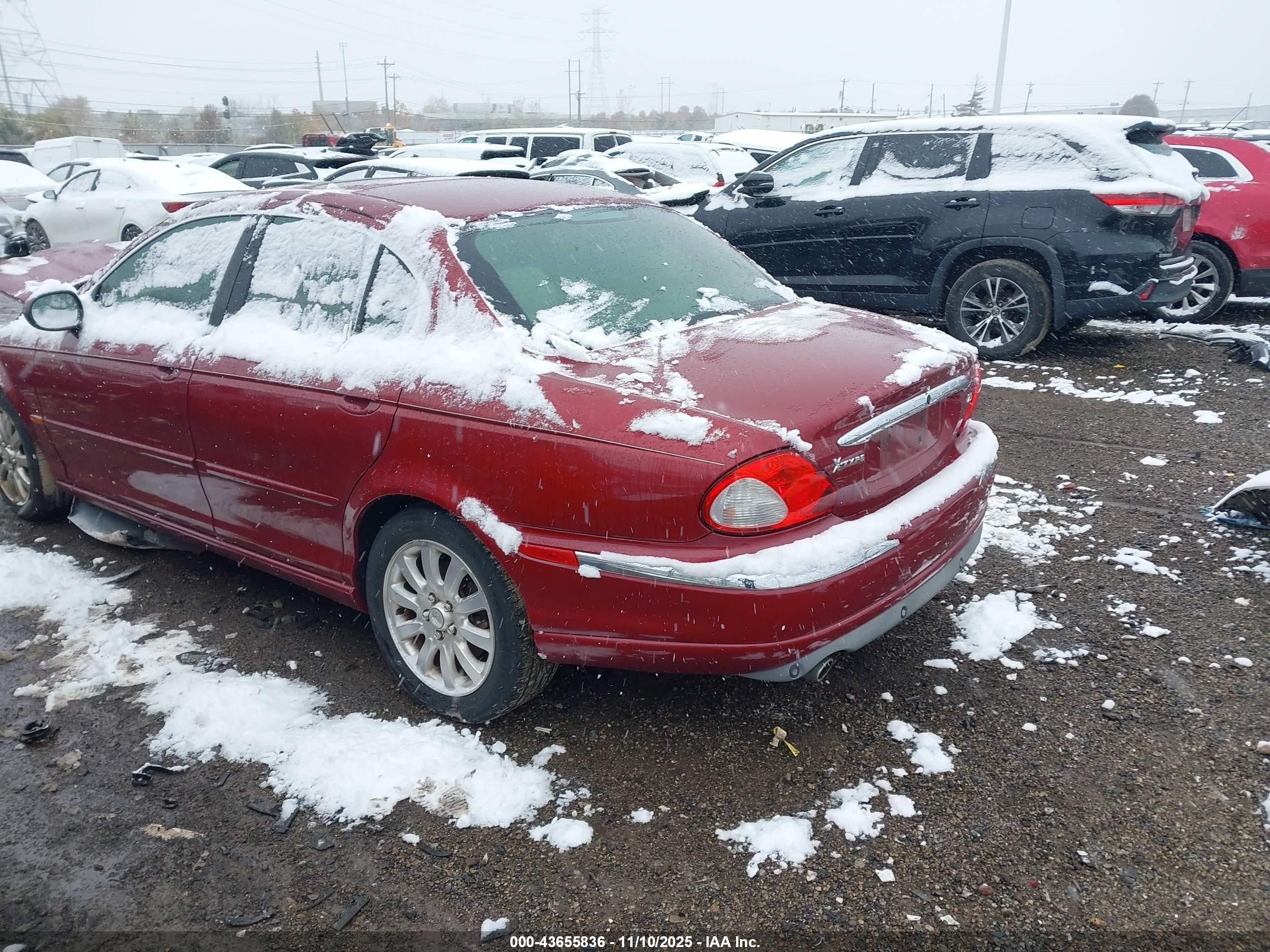 2002 Jaguar X-type 2.5l Red vin: SAJEA51D52XC67098
