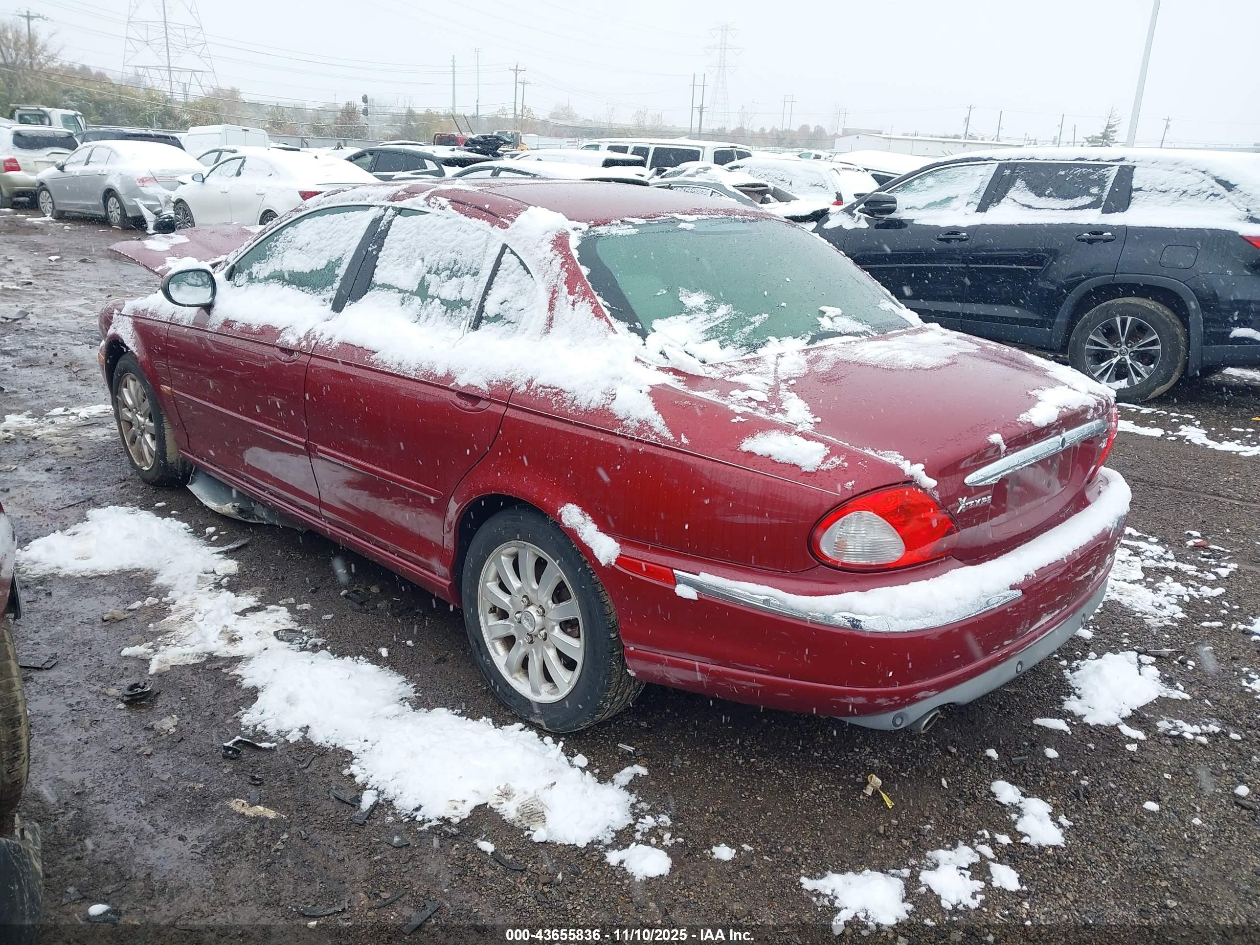 2002 Jaguar X-type 2.5l Red vin: SAJEA51D52XC67098