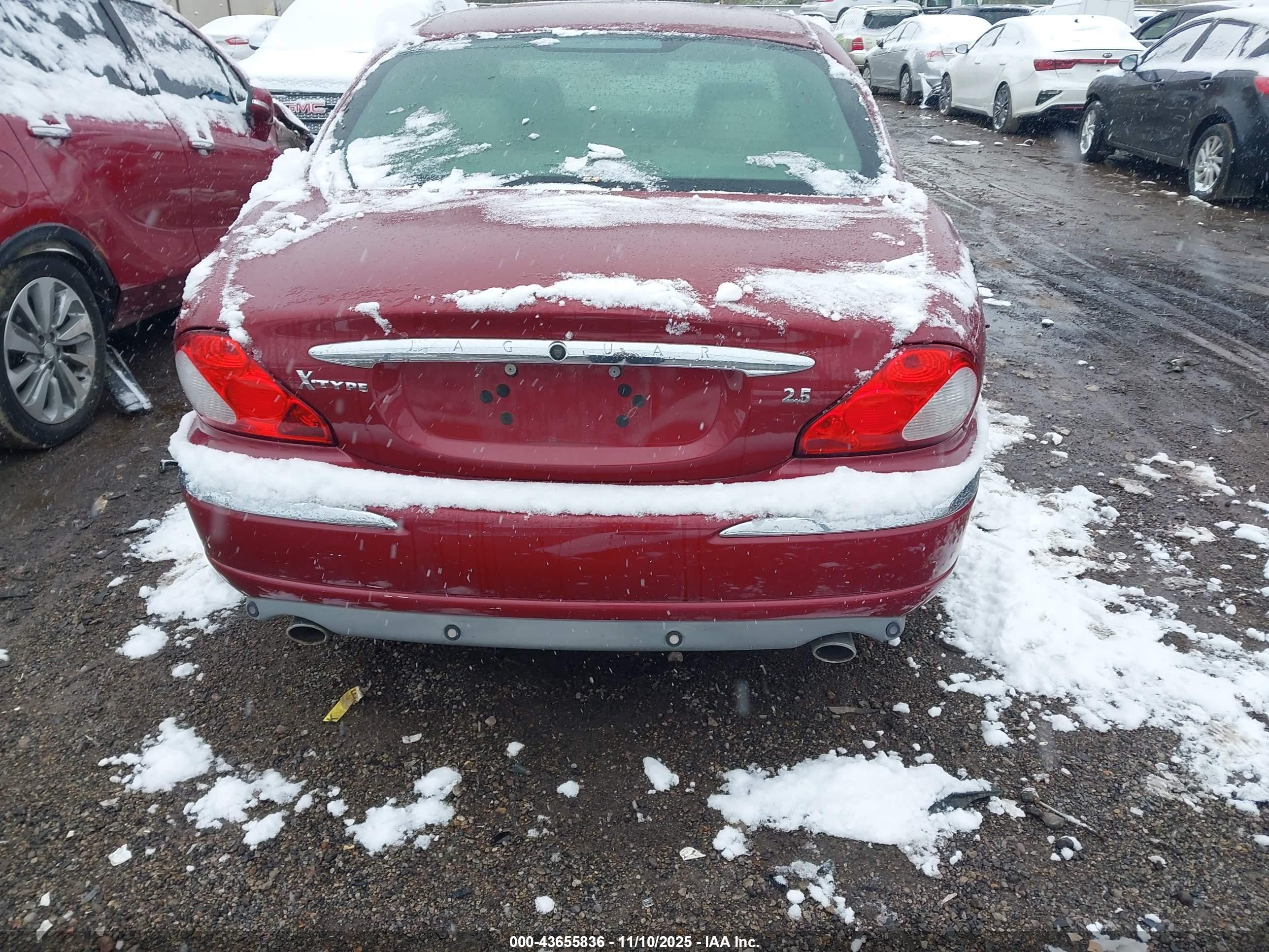 2002 Jaguar X-type 2.5l Red vin: SAJEA51D52XC67098