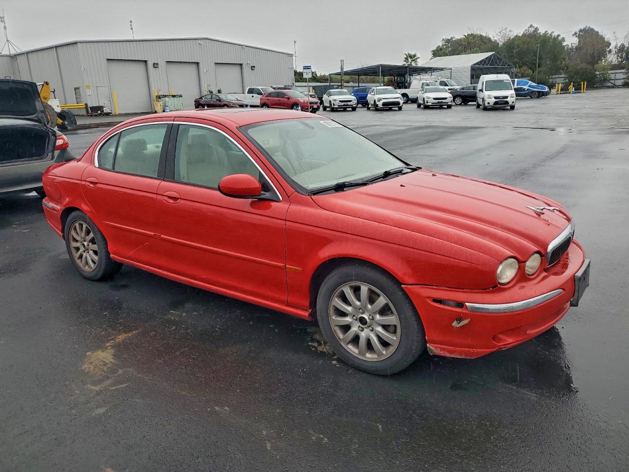 2002 Jaguar X-type 2.5 Red vin: SAJEA51D62XC56918