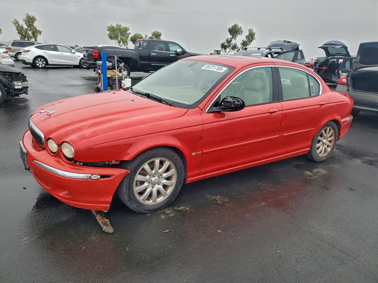 2002 Jaguar X-type 2.5 Red vin: SAJEA51D62XC56918