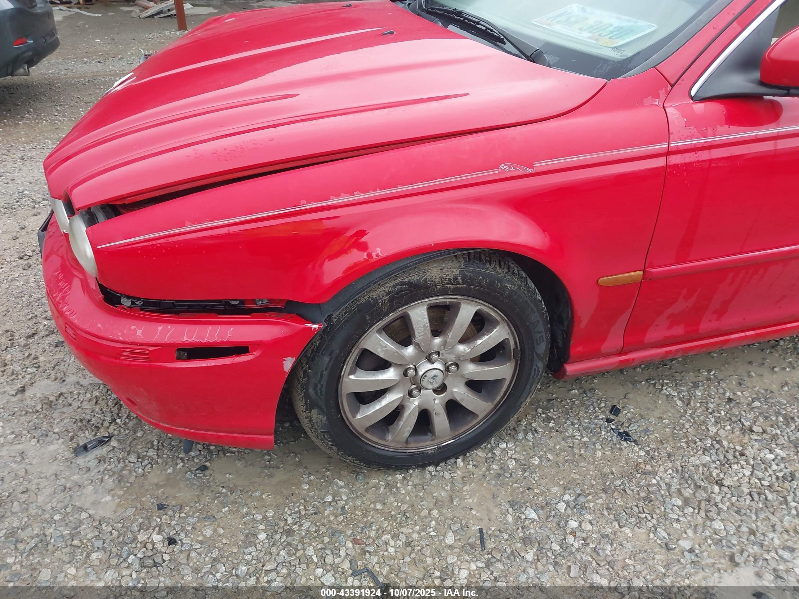 2002 Jaguar X-type 2.5l Red vin: SAJEA51D72XC23717