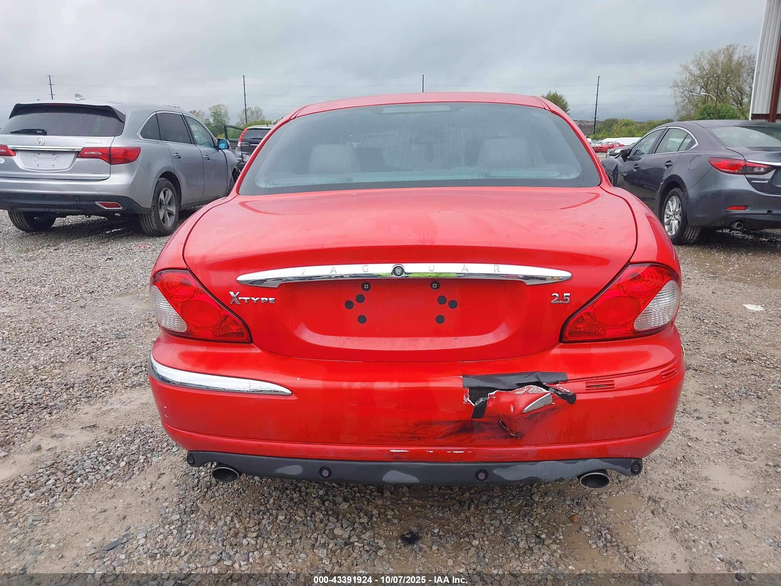 2002 Jaguar X-type 2.5l Red vin: SAJEA51D72XC23717
