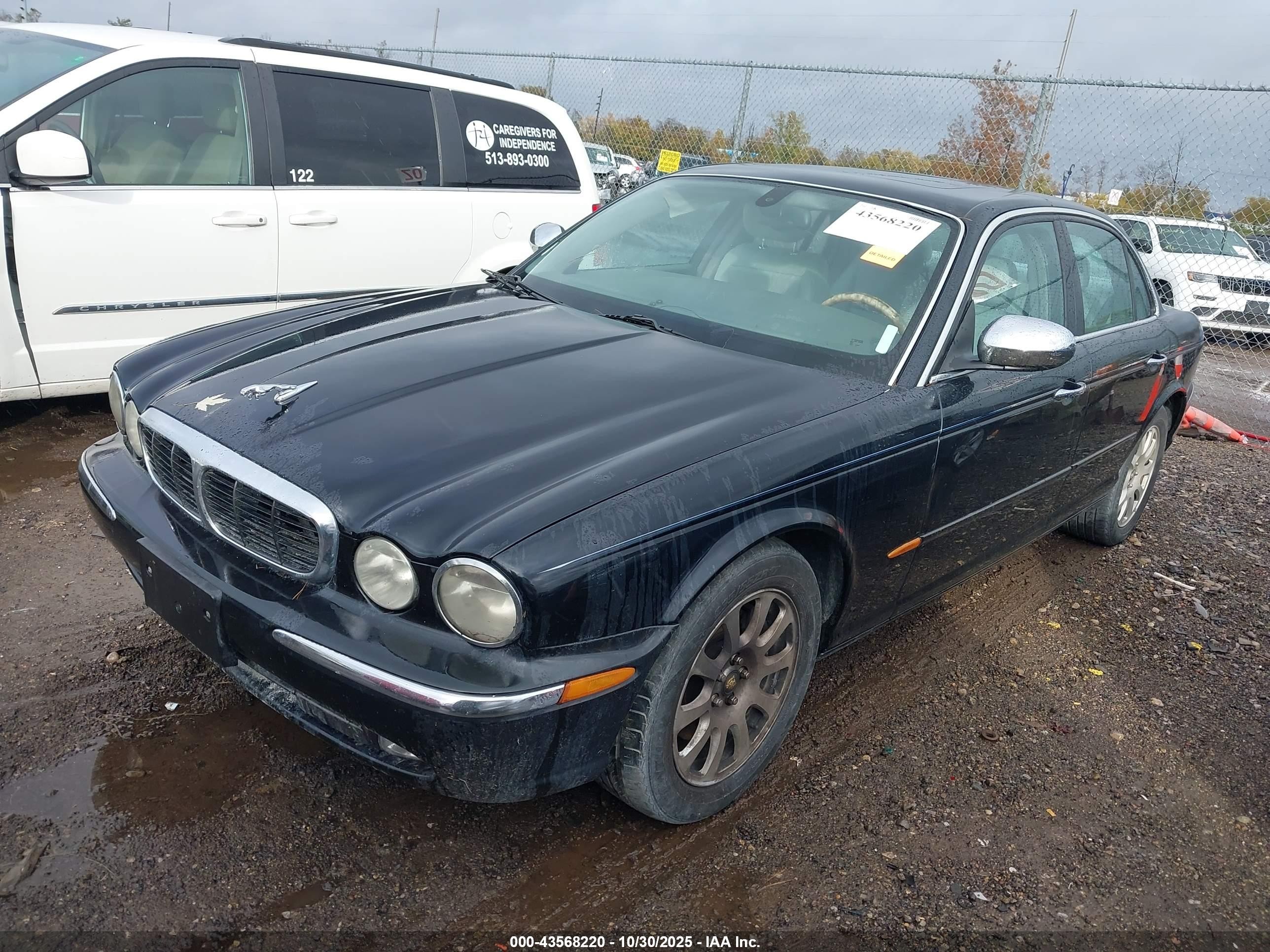 2004 Jaguar Xj Xj8 Black vin: SAJEA71C94SG05850