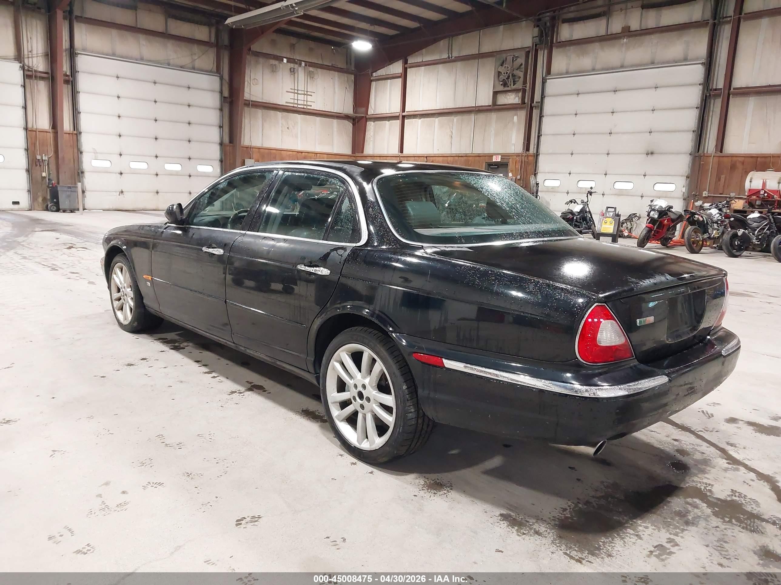 2004 Jaguar Xj Xjr Black vin: SAJEA73B64TG10714