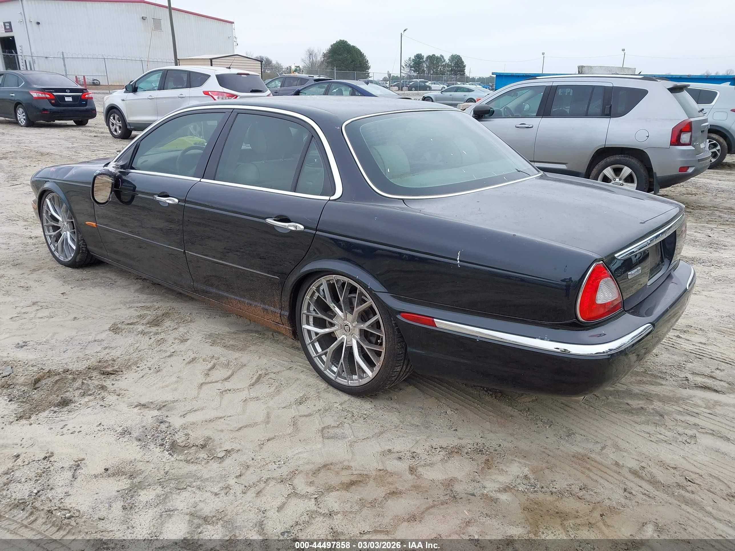 2004 Jaguar Xj Vanden Plas Black vin: SAJEA74C94SG05178